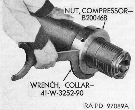 Figure 22. Installing compressor nut on compressor tube.