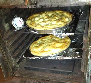 photo of pies baking in oven