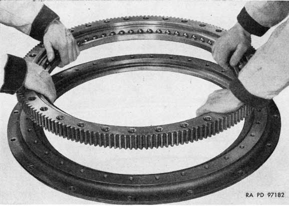 Figure 148. Removing gear and bearing from base.