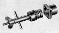 Figure 4-33. Special spring-unloading and loading
wrench with spring fully loaded.