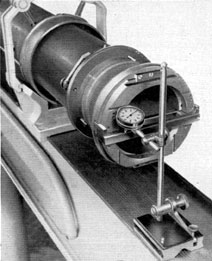 Figure 4-53. Dial indicator attached to surface
gage, on 90 degrees straight-edge at the left side for
range position.