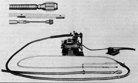 Figure 9-4. Cleaning gear with a vibrating head and expanding wire brush.