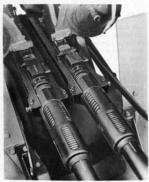 Figure 45. Guns on Cradle with Right-Hand
Barrel Spring Case Turned Over.