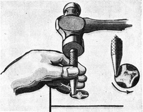 FIG. 93. REMOVING BROKEN TAP WITH PUNCH.