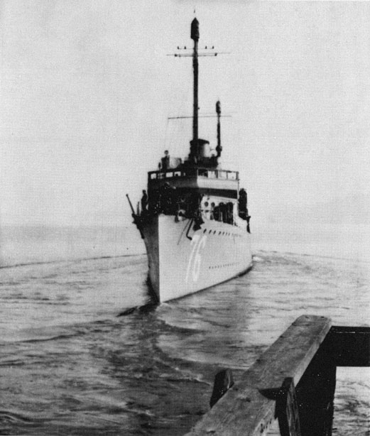 Photo showing USS Philip coming into the pier.