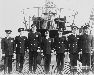 Photo of the officers before the conning tower.