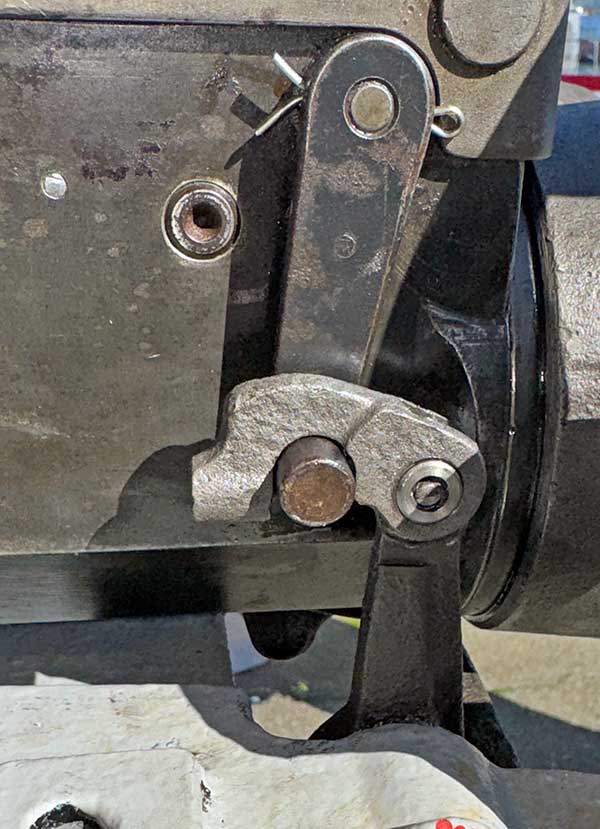 trigger link clipped onto a gun mechanism trigger.