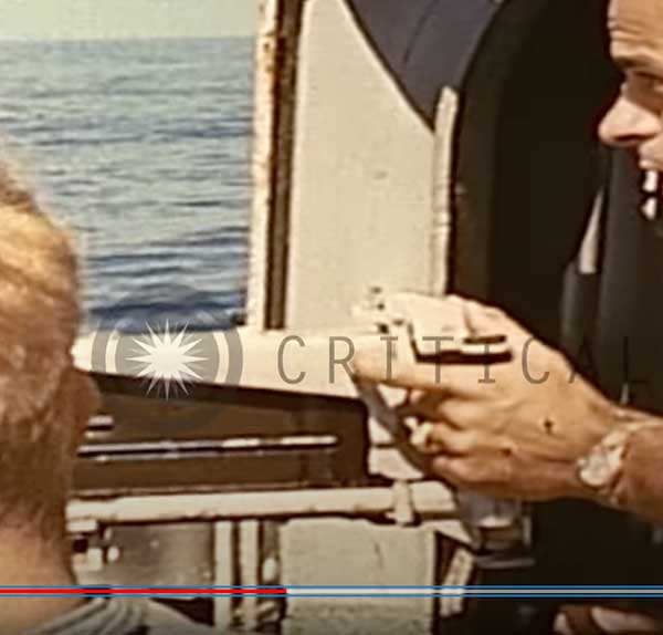 photo of gun in use on a submarine 