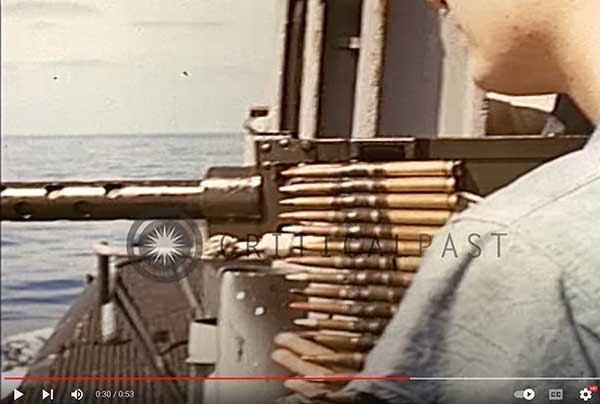 photo of gun in use on submarine 