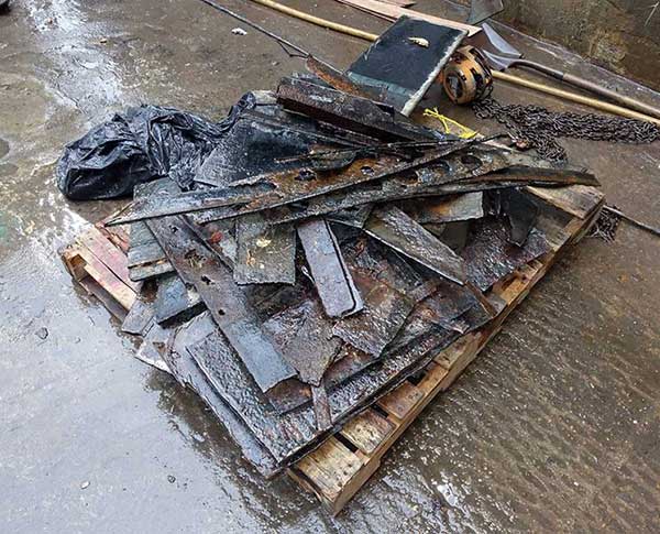 pallet full of removed rusty material