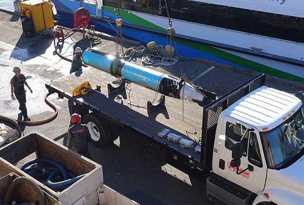 torpedo on truck staring to be lifted