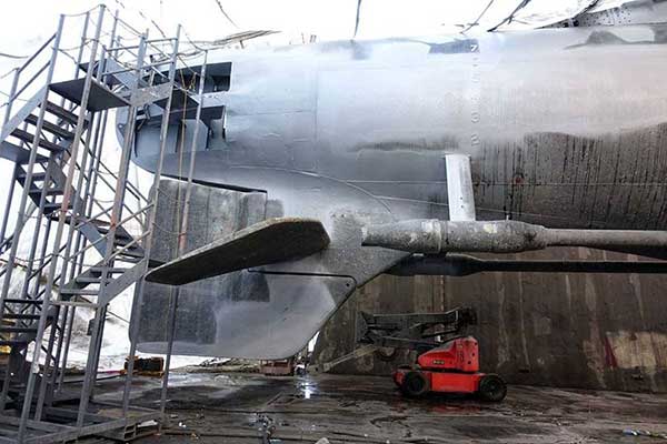 stern blasted to bare metal
