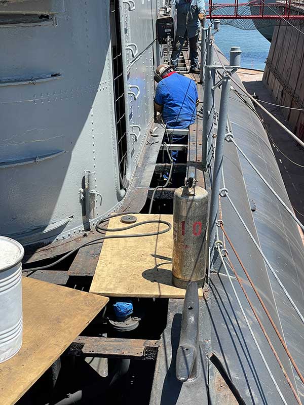 photo on starboard side show repairs
