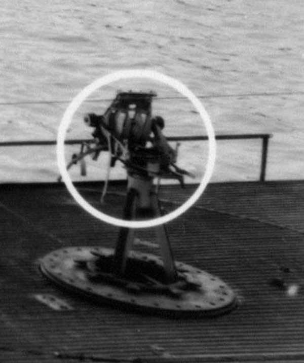 crop of photo showing twin twenty on forward gun mount