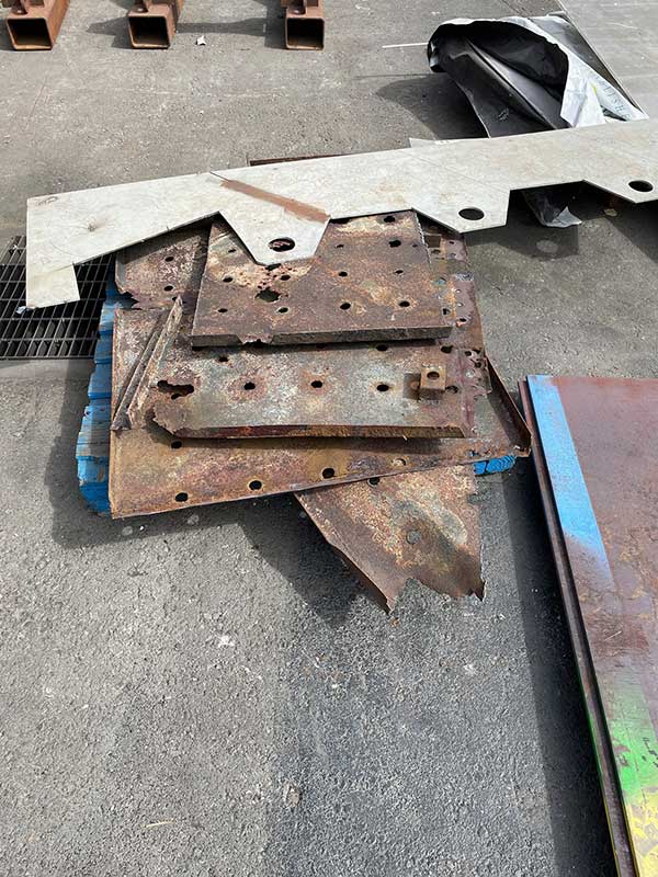 removed, rusted deck pieces