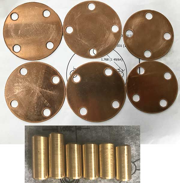 photo of 6 discs and six pins