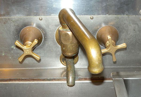 photo of scullery faucet with handles