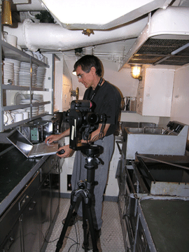 Bruce shooting in the galley aboard USS Pampanito.